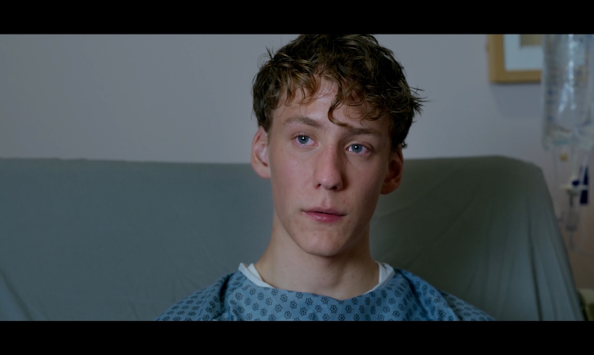 This is a scene of a kid feeling betrayed by his friend